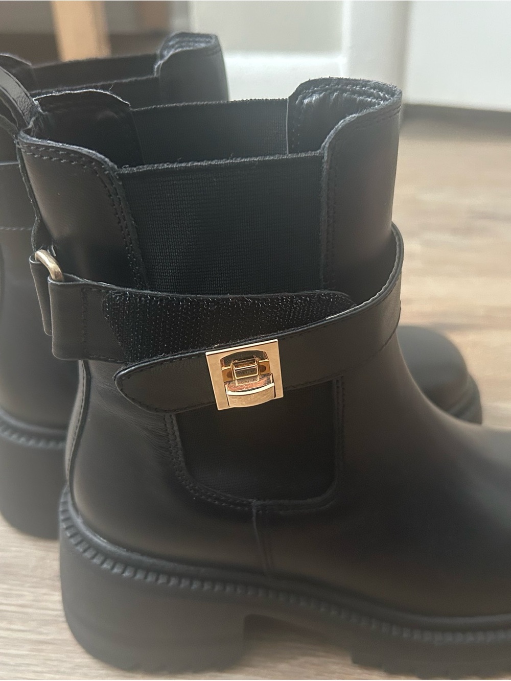 Steve Madden Black Leather Ankle Booties with Gold Accent
